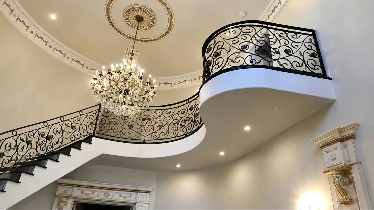 Curved iron staircase railing